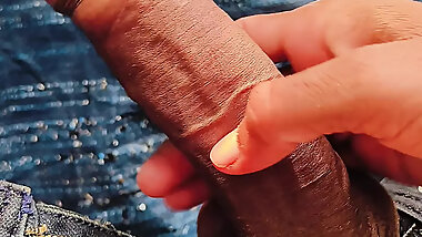 Outdoor  cum  shot  ?  a  young  boy who is masterbating   outdoor under mango tree