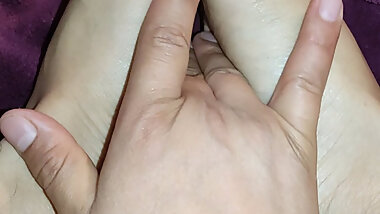 Wetting your feet a little and then putting a little moisturizer with your hand