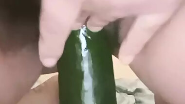 Video chat with a young girl with a hairy pussy who puts cucumber in her mouth